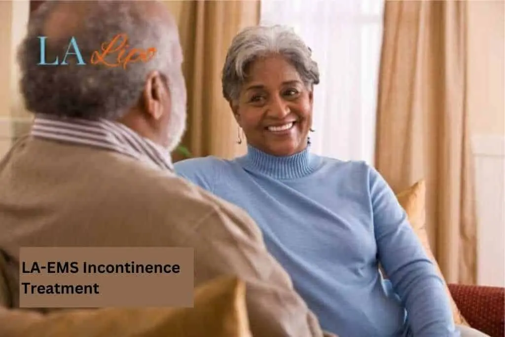 Couple sat smiling at each other - LA-EMS treatment Sevenoaks